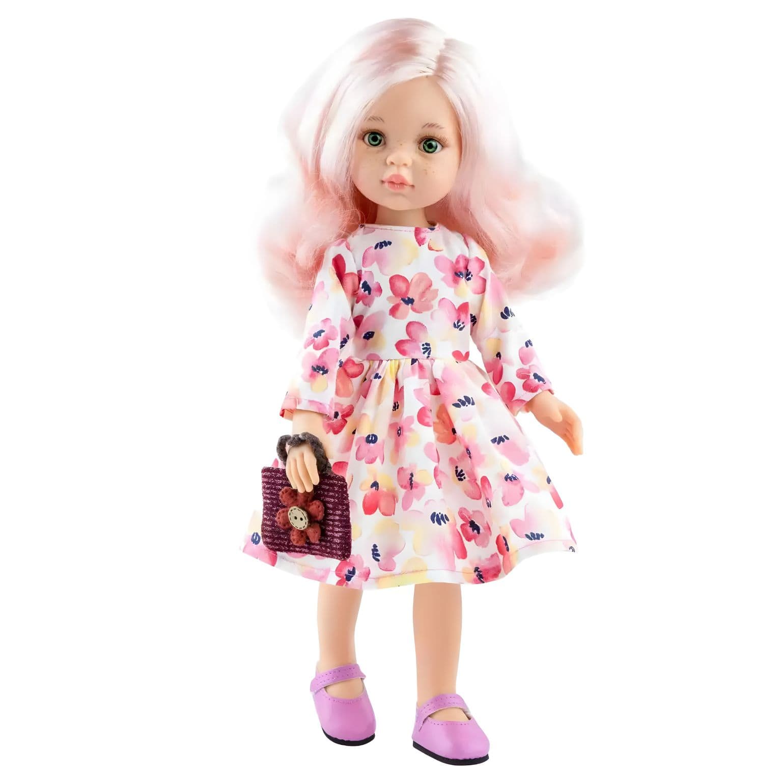 Boneca Rosa com vestido floral da Paola Reina com cabelo rosa e pequena mala