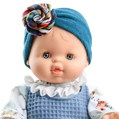 Paola Reina Blanca doll with blue outfit, white collar and blue turban with colorful flower