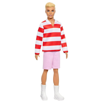 Ken doll with red and white striped shirt, pink shorts, and white sneakers