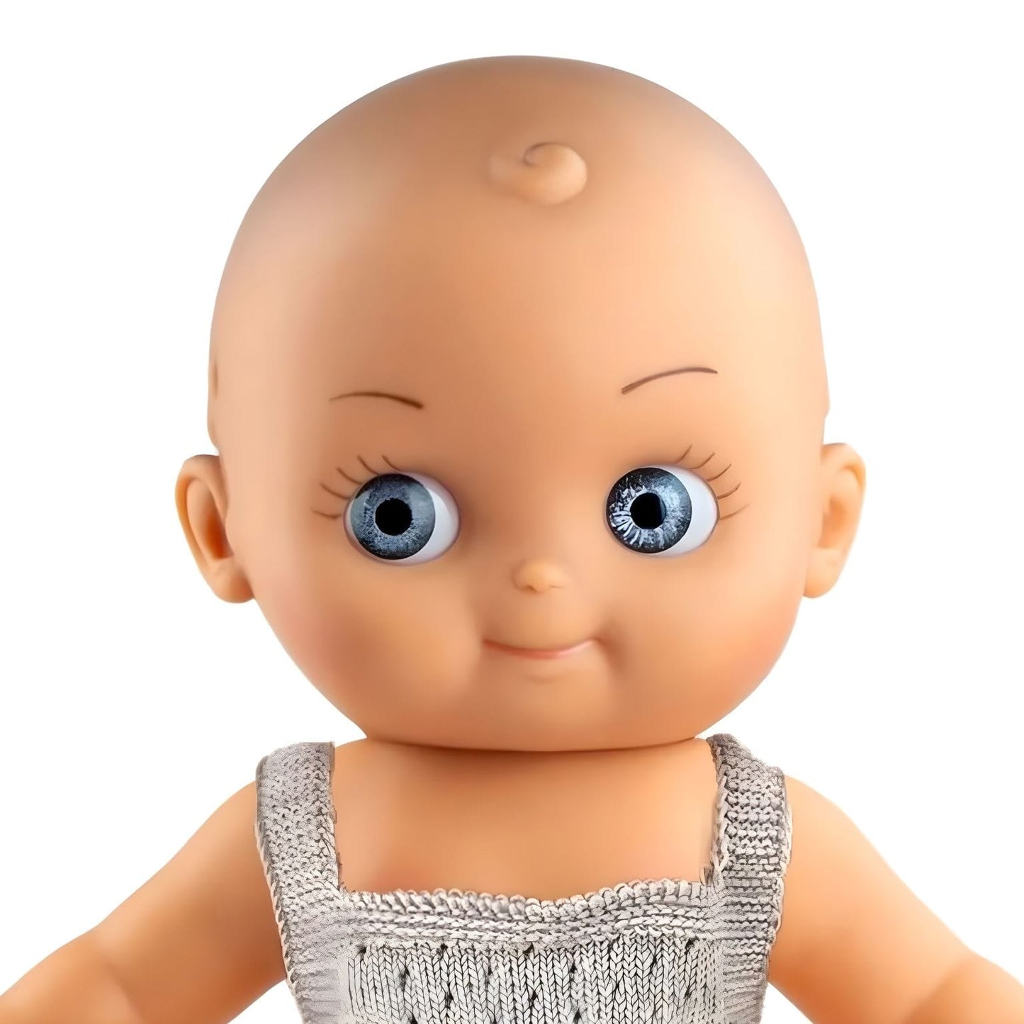 Detalhe do Boneco Mini Panchas com pijama creme para histórias ternurentas