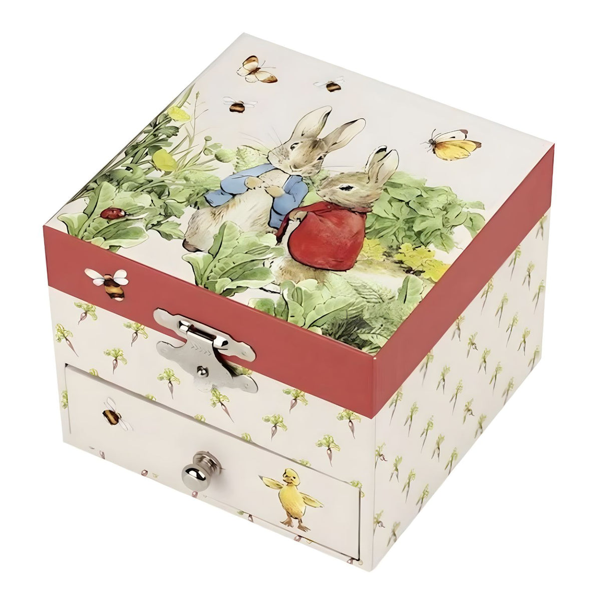 Caixa de música Peter Rabbit Cenoura fechada, com ilustração de coelhos na tampa e gaveta frontal