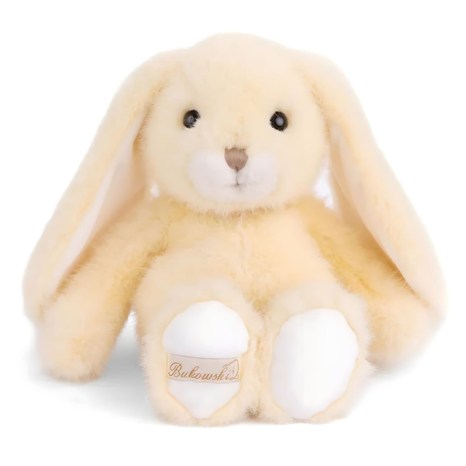 Coelho de peluche cor de baunilha com orelhas compridas, focinho creme e patas brancas