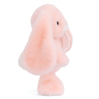Peach-colored plush rabbit with long ears, cream snout and white paws