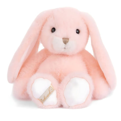 Peach-colored plush rabbit with long ears, cream snout and white paws