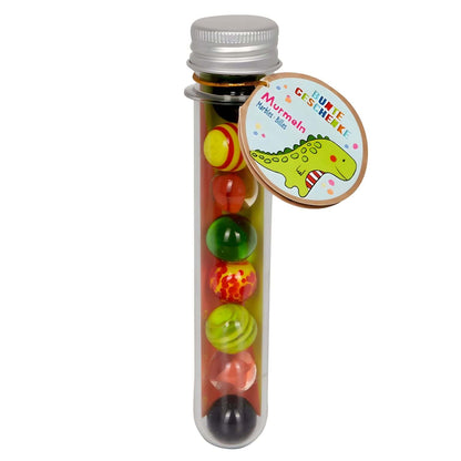 Spiegelburg Green Dinosaur marble set in tube with colorful marbles
