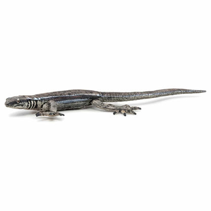 Toy figure common lizard in profile view
