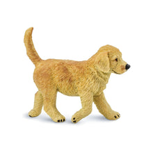 Cria Golden Retriever de brinquedo em figura de borracha