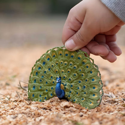 Rubber Peacock figure in rear view