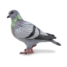 Figura de borracha pombo em vista lateral
