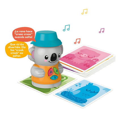 Child playing with "I Learn" Game: "I Learn with Coco" by Diset with illustrated cards and interactive doll