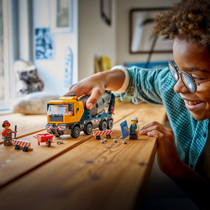 Lego City Concrete Mixer Truck with minifigures and construction barriers