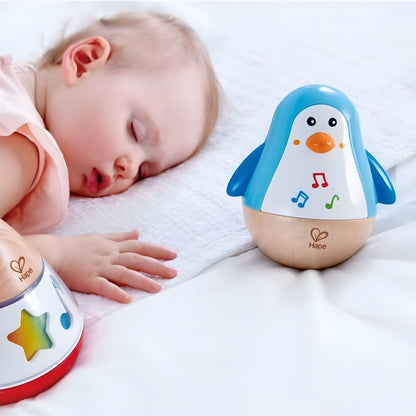 Hape musical toy in the shape of a wobbling penguin