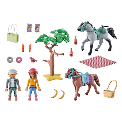 Playmobil Horseback Ride with two figures, two horses, a tree, and a picnic on the beach
