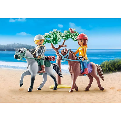 Playmobil Horseback Ride with two figures, two horses, a tree, and a picnic on the beach