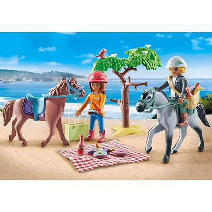 Playmobil Horseback Ride with two figures, two horses, a tree, and a picnic on the beach