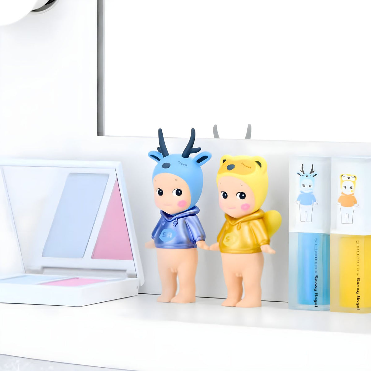 Sonny Angel x shu uemura Makeup Angel Series collection on a light background