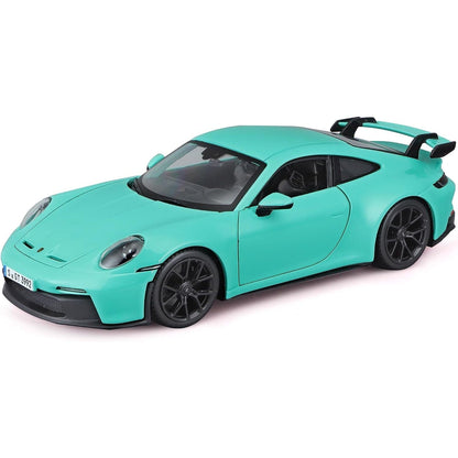 Porsche 911 GT3 2021 Menta verde em miniatura, vista lateral dianteira